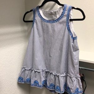 Blue striped sleeveless top with embroidery detail